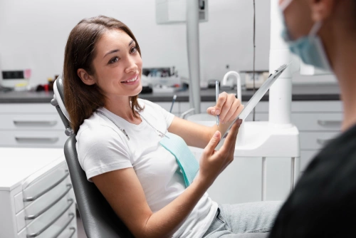 Close up smiley patient at dental implant consultation